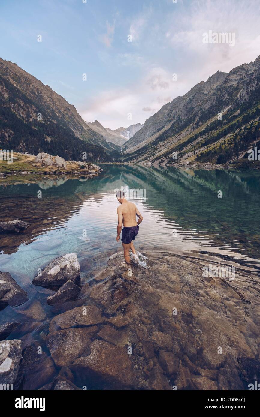 Man bathing in lake of Gaube Stock Photo