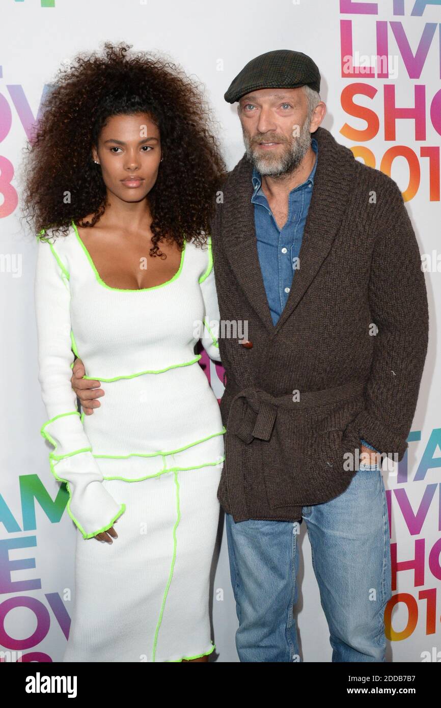Vincent Cassel and Tina Kunakey attending the Etam Fashion Show as part of Paris Fashion Week