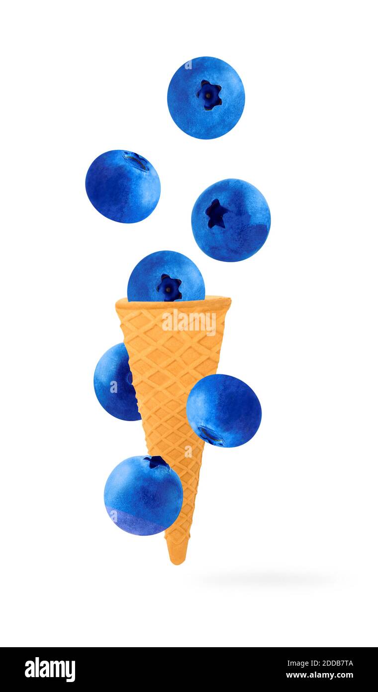 Isolated ice cream cone with fruits in the air. Falling blueberries ...