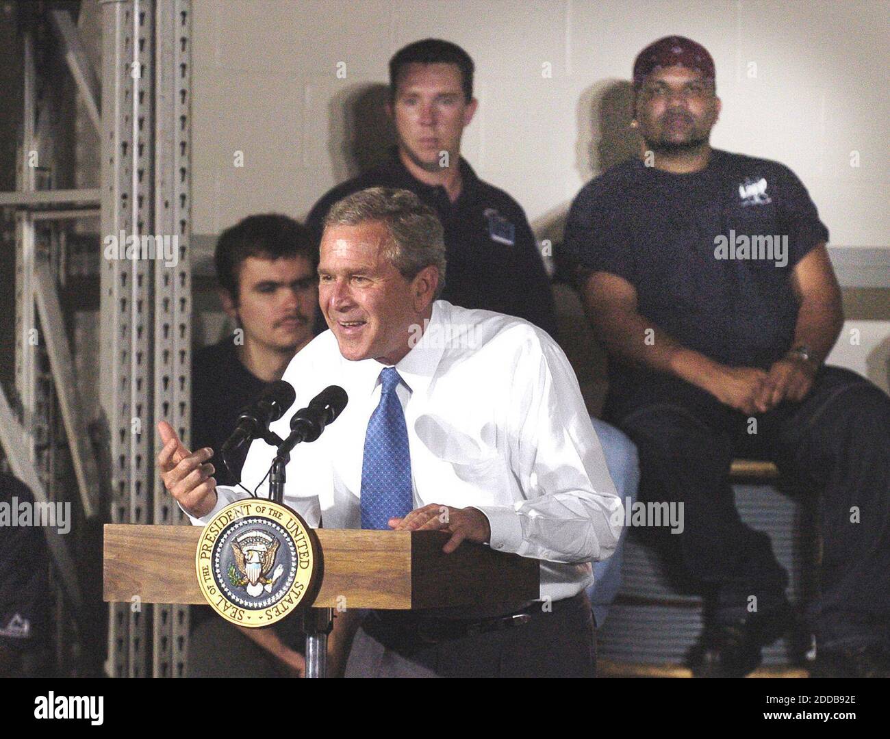 NO FILM, NO VIDEO, NO TV, NO DOCUMENTARY - President George W. Bush speaks to workers at Lapp Electric Service Inc. in Smoketown, Pennsylvania, on Friday, July 9, 2004. Photo by Ron Cortes/KRT/ABACA. Stock Photo