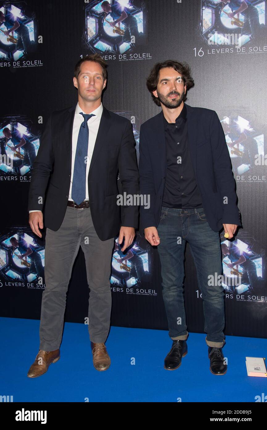 Spationaute Thomas Pesquet And Director Pierre Emmanuel Le Goff Arriving For The Premiere Of The Documentary 16 Levers De Soleil Held At Le Grand Rex Theatre In Paris France On September 25 18