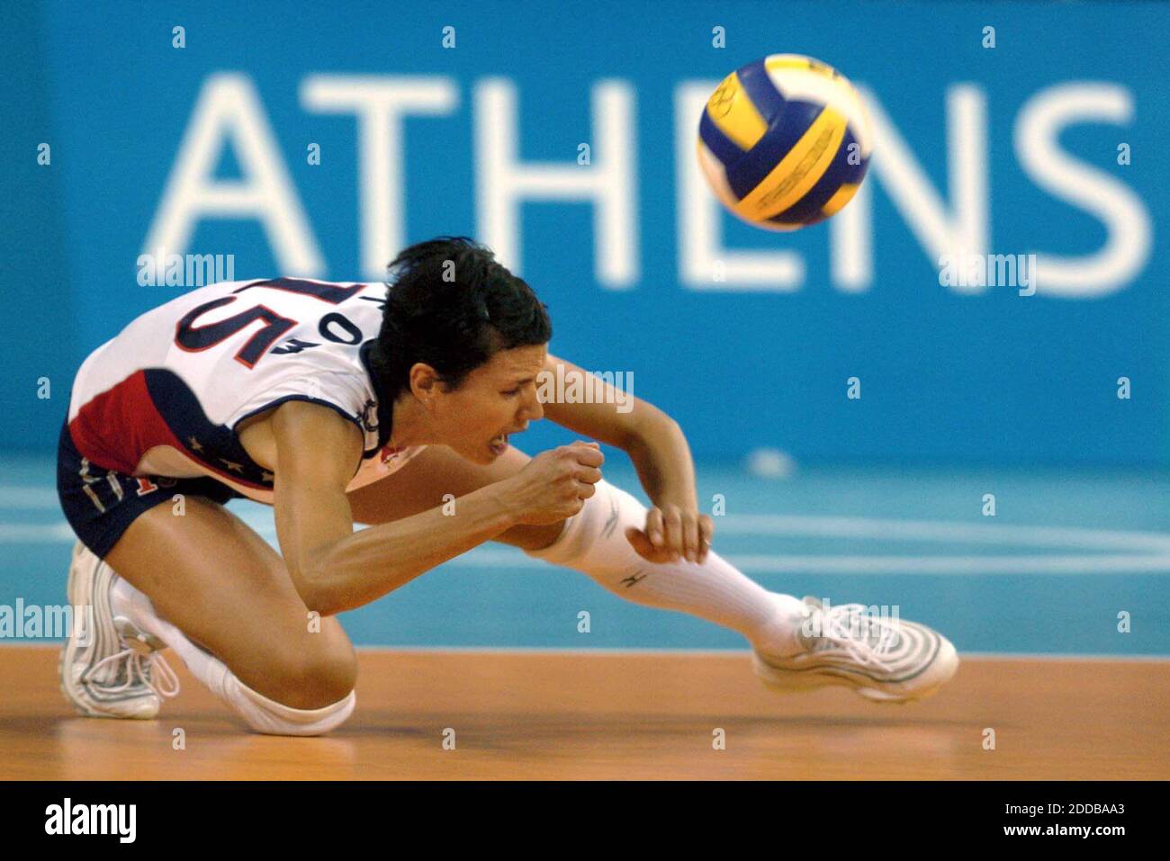 NO FILM, NO VIDEO, NO TV, NO DOCUMENTARY - Logan Tom of the United States can't make a dig as the American fall to the Dominican Republic in the volleyball competition at the 2004 Olympic Games on Wednesday, August 18, 2004. Photo by Karl Mondon/Contra Costa Times/KRT/ABACA Stock Photo
