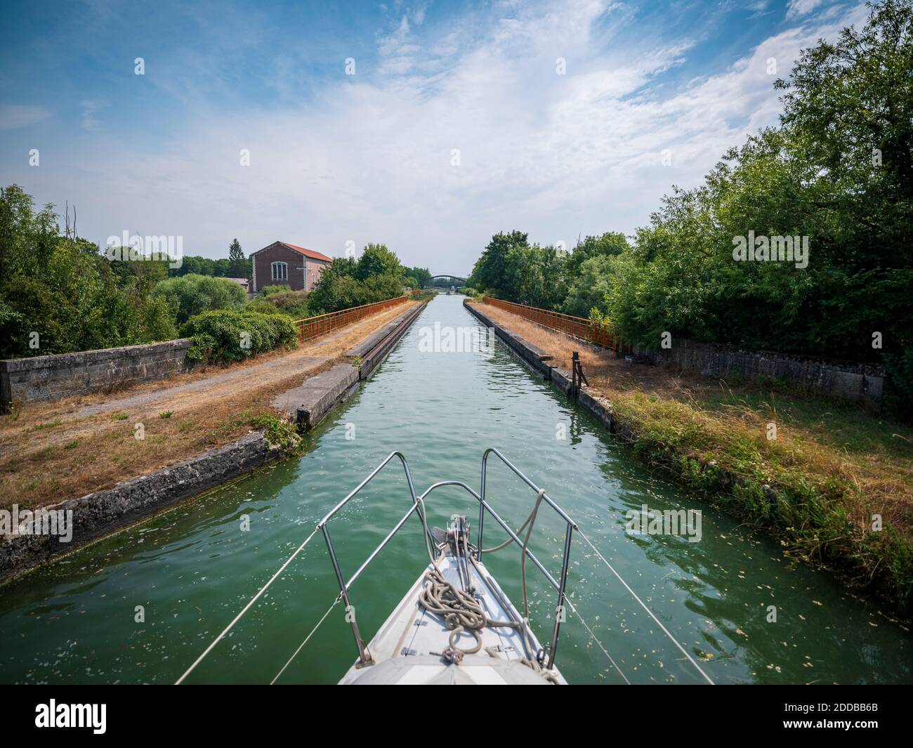 France, Aisne, Bow of boat sailing along Canal De L'Oise A L'Aisne Stock Photo