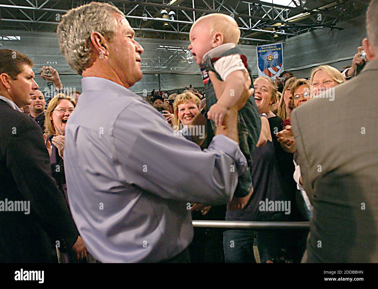 Baby Picked Up High Resolution Stock Photography And Images Alamy