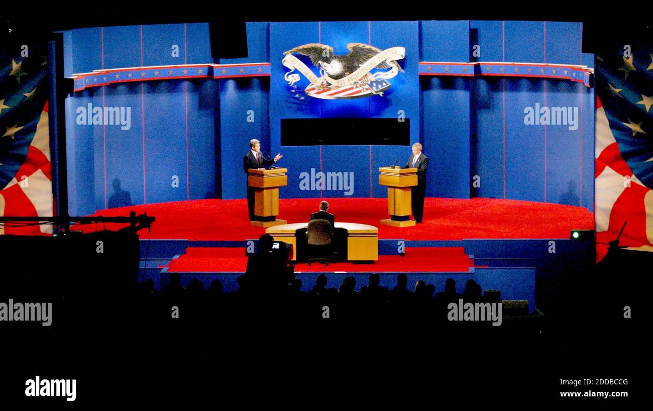 NO FILM, NO VIDEO, NO TV, NO DOCUMENTARY - President George W. Bush, right, and Democratic challenger Sen. John Kerry participate in the first presidential debate at the University of Miami Convocation Center in Coral Gables, Florida, Thursday, September 30, 2004. Photo by Jared Lazarus/Miami Herald/KRT/ABACA. Stock Photo