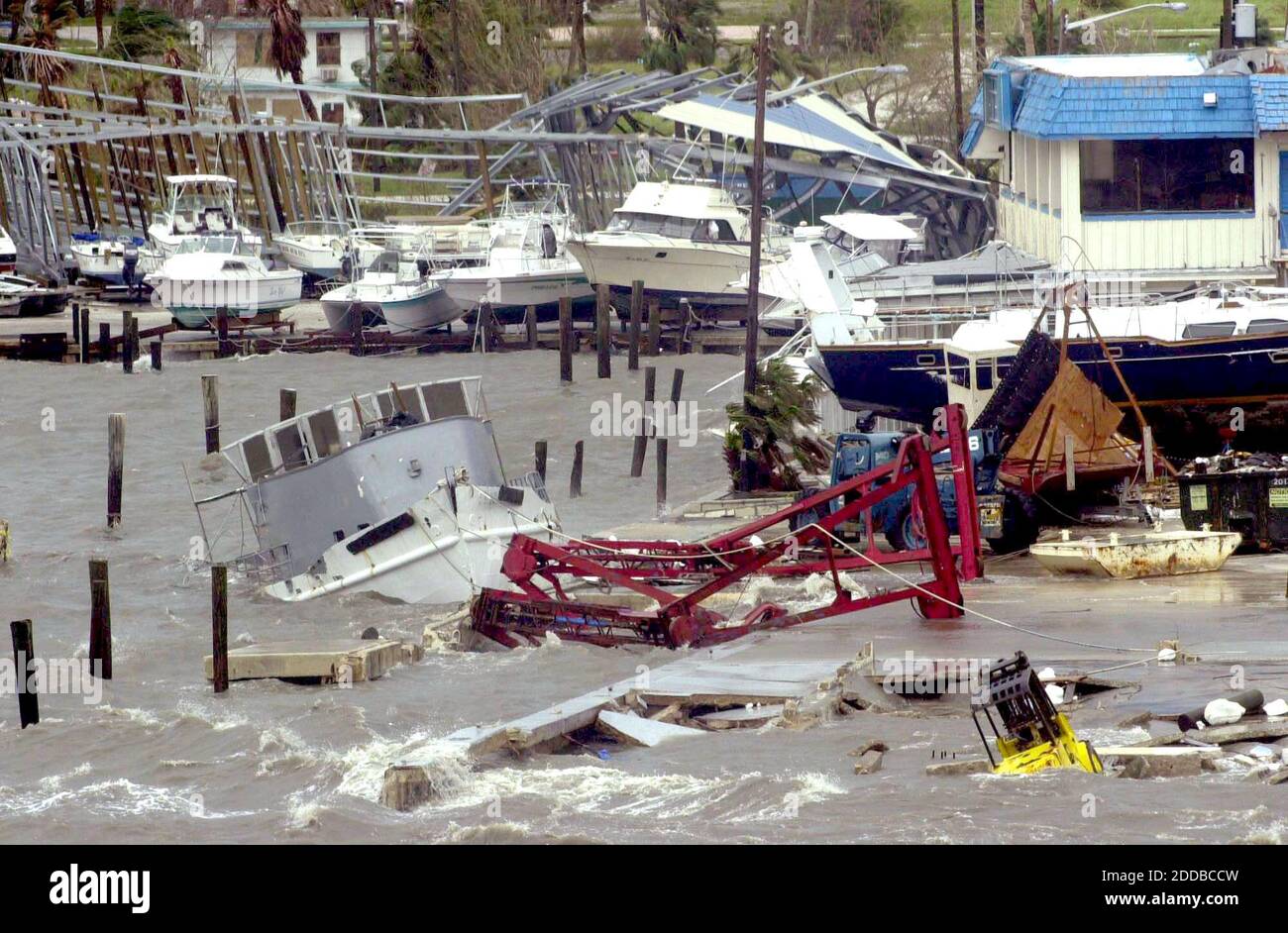 NO FILM, NO VIDEO, NO TV, NO DOCUMENTARY - A marina on the north side of the bridge headed for Hutchinson Island, Florida, took a strong hit after Hurricane Jeanne came ashore late in Fort Pierce on September 25, 2004. The area had already suffered heavy damage from Hurricane Frances three weeks ago. Photo by Peter Andrew Bosch/Miami Herald/KRT/ABACA. Stock Photo