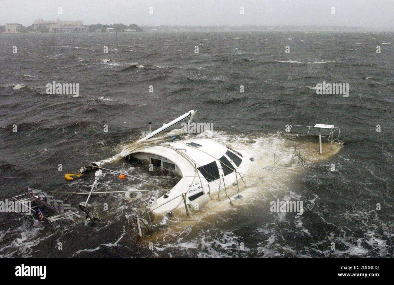 NO FILM, NO VIDEO, NO TV, NO DOCUMENTARY - A sailboat rests submerged in the Manatee River after it suffered damage by Hurricane Jeanne on September 26, 2004. Photo by Grant Jefferies/Bradenton Herald/KRT/ABACA. Stock Photo