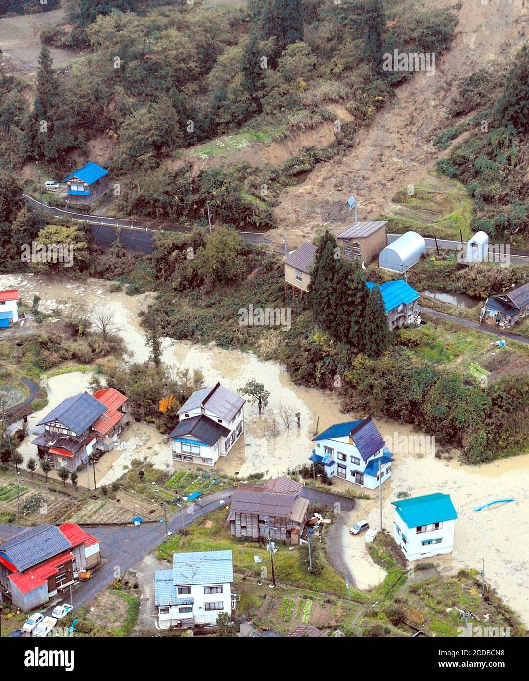NO FILM, NO VIDEO, NO TV, NO DOCUMENTARY - Quake-stricken Yamakoshimura, Niigata Prefecture, is flooded Tuesday morning, October 26, 2004, after heavy rainfall overnight. The flooding occurred after the deadliest earthquake to hit the country in nearly a decade, on October 23, measured 6.8 and killed 31. Photo by Yomiuri Shimbun/KRT/ABACA. Stock Photo