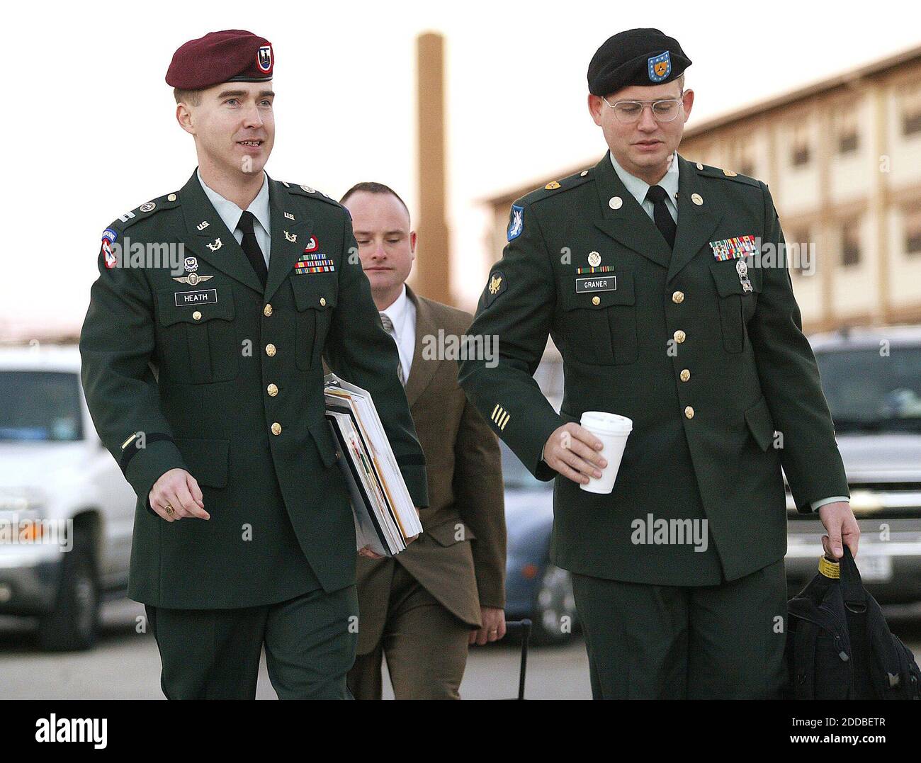 NO FILM, NO VIDEO, NO TV, NO DOCUMENTARY - Capt. Jay Heath (left) and Specialist Charles A. Graner (right) approach the court building for closing arguments in Graner's court martial on Friday morning, January 14, 2005. Army Specialist Charles A. Graner, Jr. faces a court martial in Ft. Hood, Texas, for his involvement in the Abu-Ghraib prisoner abuse scandal in Iraq. Photo by Ralph Lauer/Fort Worth Star Telegramme/KRT/ABACA. Stock Photo