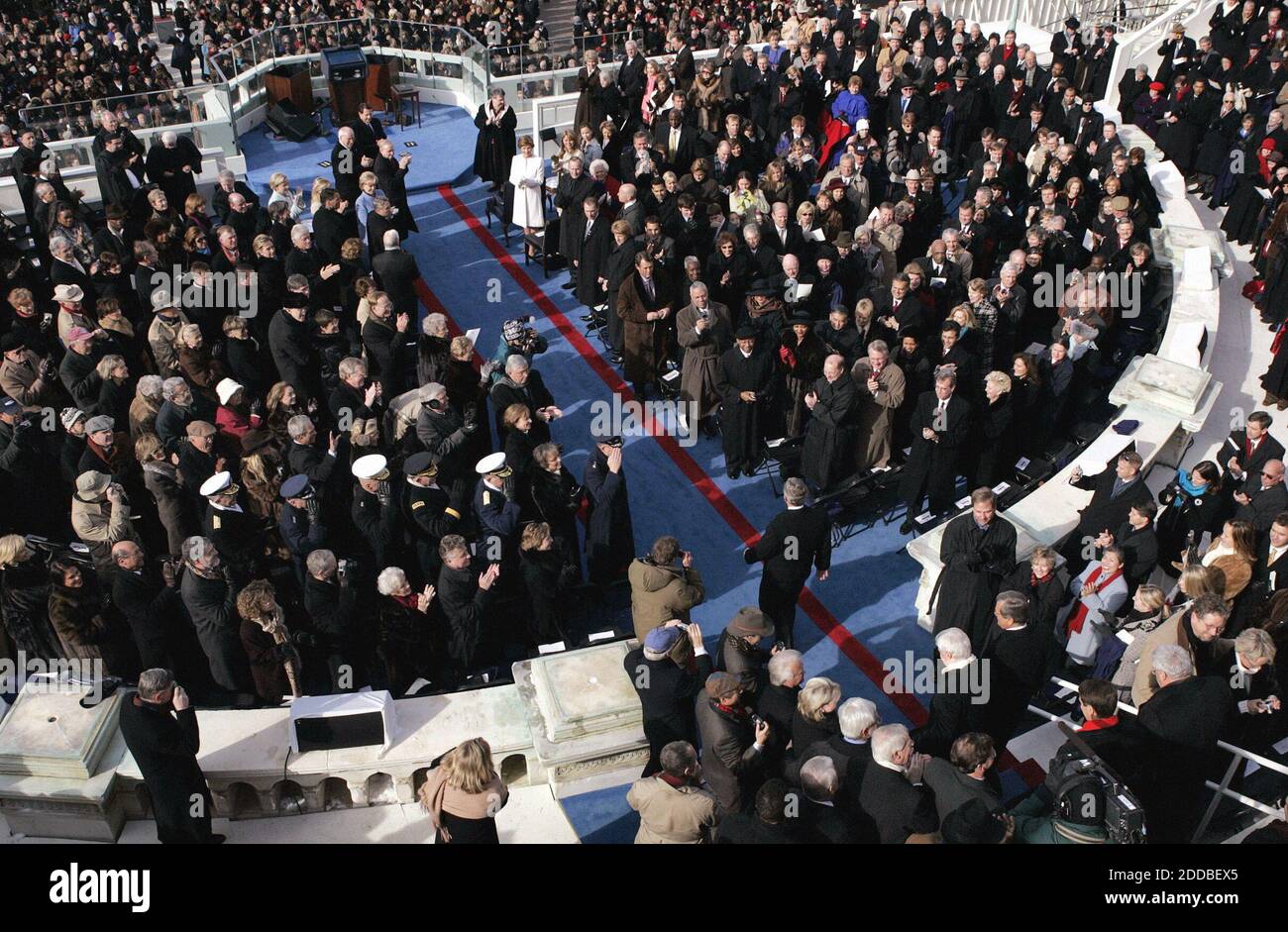 NO FILM, NO VIDEO, NO TV, NO DOCUMENTARY - Gathered diginitaries stand and applaud President George W. Bush as he makes his way onto the inaugural platform, January 20, 2005, in Washington, D.C, to be sworn in for a second term as U.S. President. Washington, DC, USA, on January 20, 2005. Photo by Chuck Kennedy/US News Story Slugged/KRT/ABACA. Stock Photo