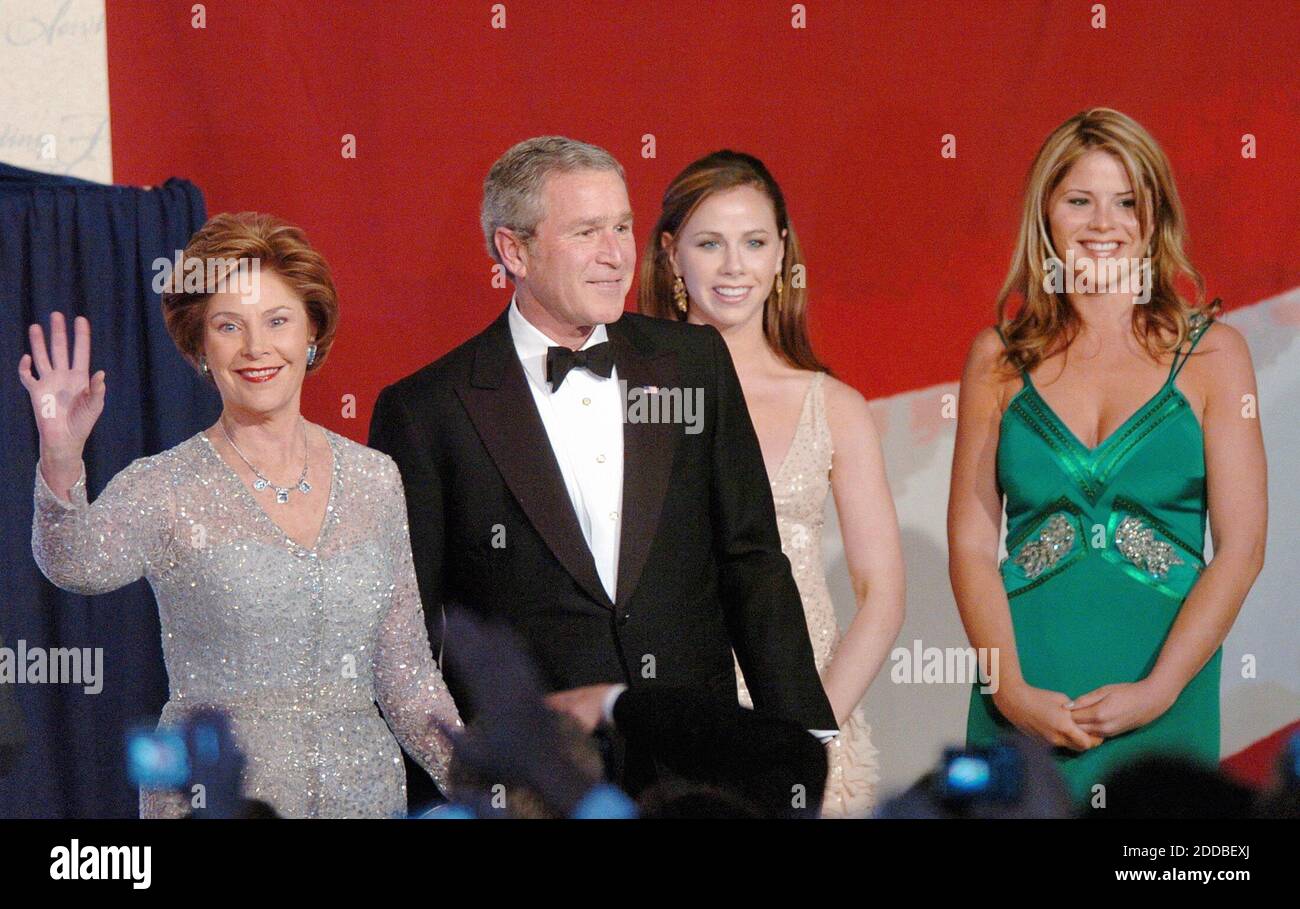 NO FILM, NO VIDEO, NO TV, NO DOCUMENTARY - President George W. Bush and first lady Laura attend the Constitution Ball with daughters Barbara, center, and Jenna in Washington, DC, USA, on January 20, 2005. Photo by Georges Bridges/US News Story Slugged/KRT/ABACA. Stock Photo