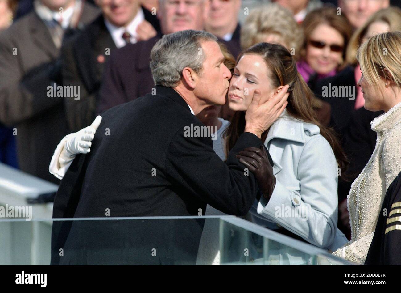 NO FILM, NO VIDEO, NO TV, NO DOCUMENTARY - President George W. Bush kisses daughter Barbara after being sworn in as U.S. President for a second term, in Washington, DC, USA, on January 20, 2005. Photo by Michael Bryant/US News Story Slugged/KRT/ABACA. Stock Photo