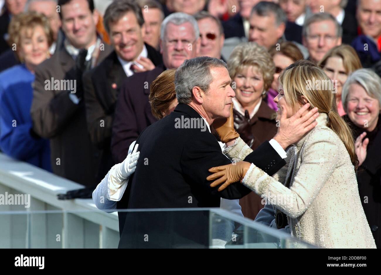 NO FILM, NO VIDEO, NO TV, NO DOCUMENTARY - President George W. Bush embraces daughter Jenna after being sworn in as U.S. President for a second term, in Washington, DC, USA, on January 20, 2005. Photo by Michael Bryant/US News Story Slugged/KRT/ABACA. Stock Photo