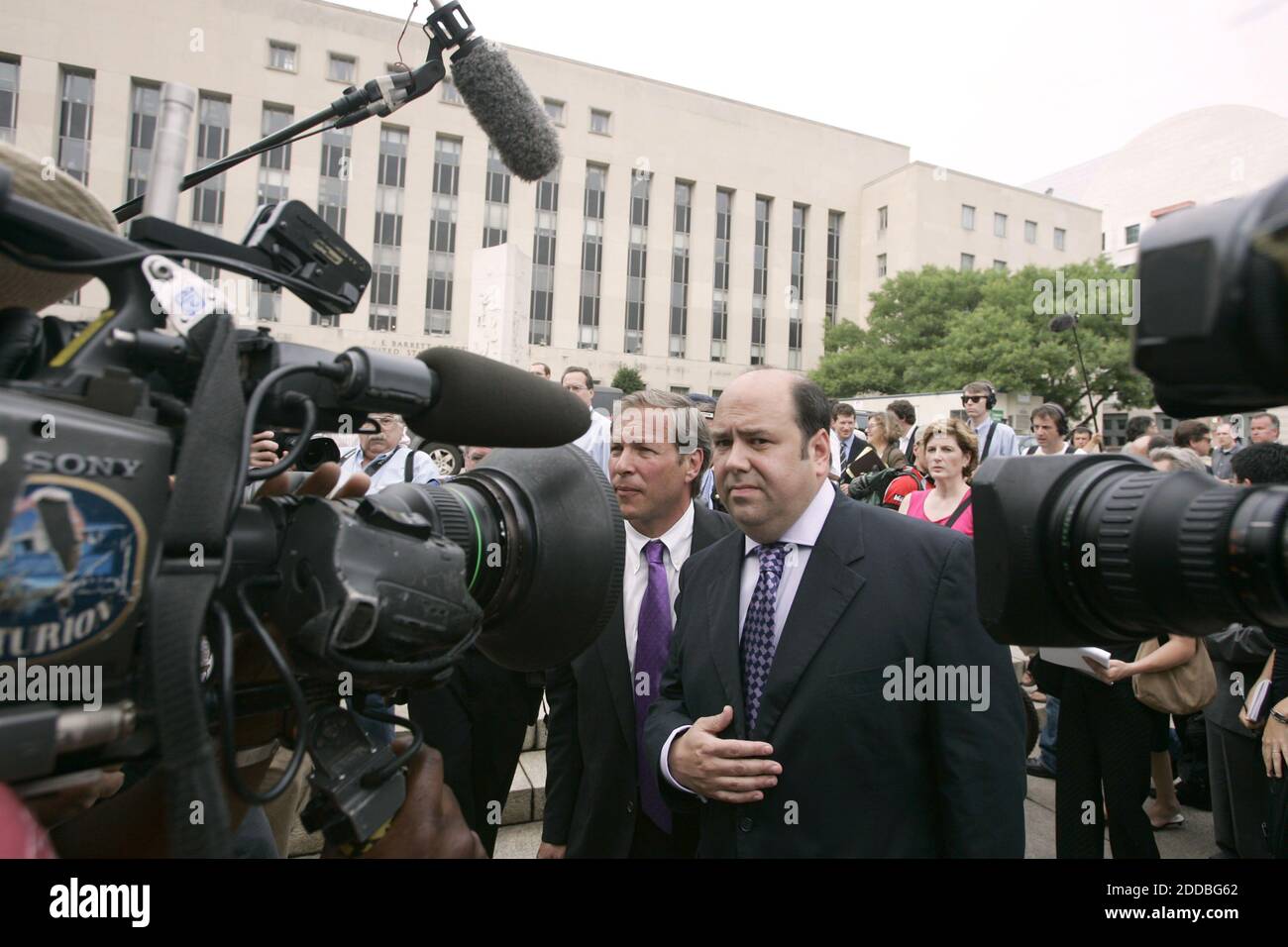 NO FILM, NO VIDEO, NO TV, NO DOCUMENTARY - Time magazine reporter Matt Cooper departs Federal Court in Washington, D.C., Wednesday, July 6, 2005. He and Judith Miller, of the New York Times, appeared in court for contempt of court for refusing to divulge their sources who identified Valerie Plame as a CIA operative. Photo by Chuck Kennedy/KRT/ABACAPRESS.COM Stock Photo