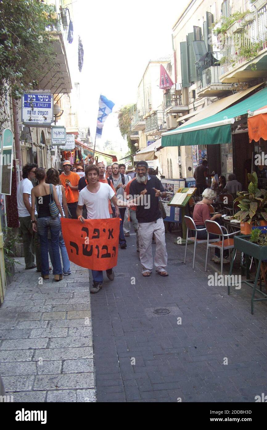 NO FILM, NO VIDEO, NO TV, NO DOCUMENTARY - A group of young settlers from the West Bank, many in orange, the color adopted by opponents of Israel's withdrawal from the Gaza Strip, marched through portions of Jerusalem on Wednesday, August 17, 2005, demonstrating support for the settlers of Gaza. Photo by Martin Merzer/Miami Herald/KRT/ABACAPRESS.COM Stock Photo