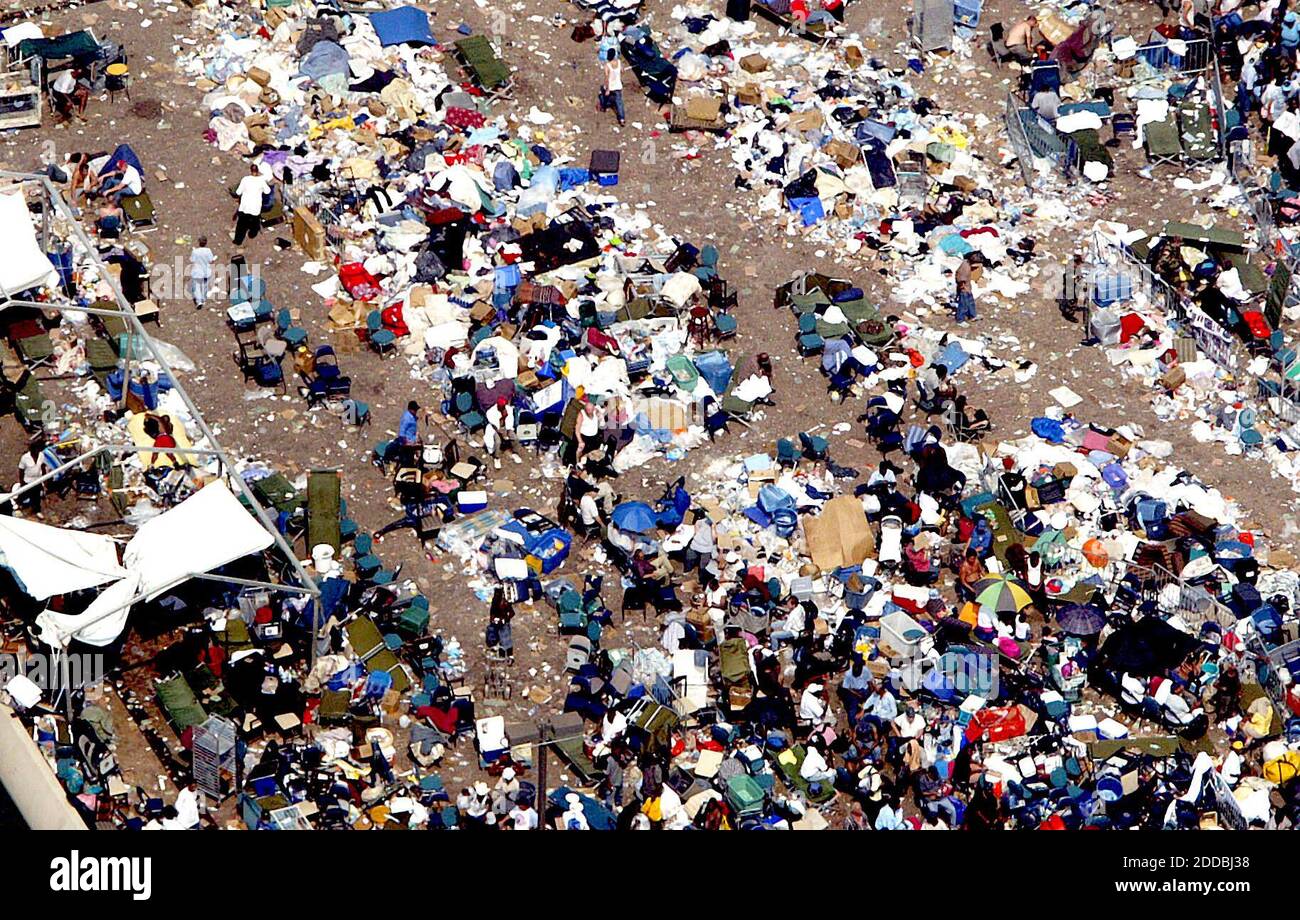 NO FILM, NO VIDEO, NO TV, NO DOCUMENTARY - People and trash lie piled up in the area near the New Orleans Superdome in Louisiana, as refugees from Hurricane Katrina wait to be taken out of the area Saturday, September 3, 2005. Photo by Nuri Vallbona/Miami Herald/KRT/ABACAPRESS.COM. Stock Photo