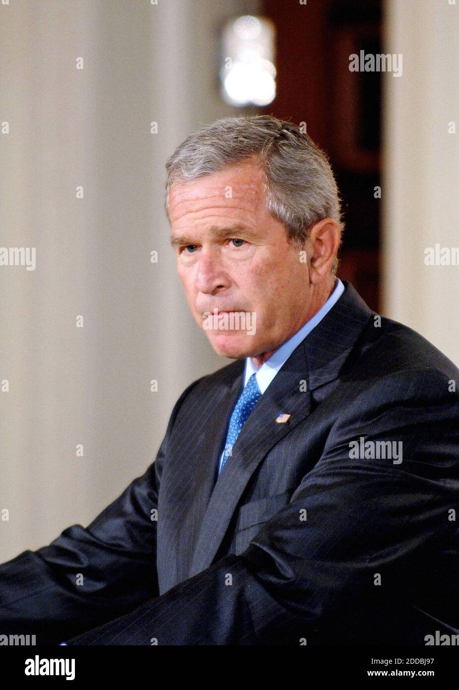 NO FILM, NO VIDEO, NO TV, NO DOCUMENTARY - President George W. Bush listens to a question about Hurricane Katrina during a press event with Iraqi President Jalal Talabani in the East Room of the White House, Washington, DC, USA, on September 13, 2005. Photo by George Bridges/KRT/ABACAPRESS.COM Stock Photo