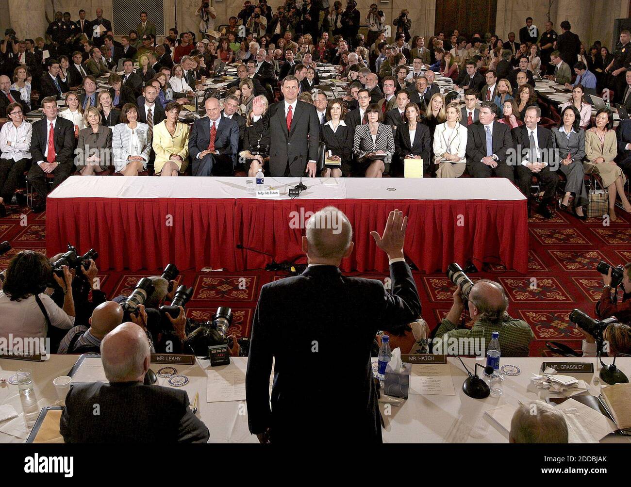 NO FILM, NO VIDEO, NO TV, NO DOCUMENTARY - John Roberts, nominee for Supreme Court Chief Justice of the United States, is sworn in by Sen. Arlen Specter before the Senate Judiciary Committee on Capitol Hill in Washington, DC, USA, on September 12, 2005. The Senate began week-long confirmation hearings on the nomination of star jurist Roberts to be the next US Supreme Court chief justice, Pesident George W. Bush's first shot at reshaping the high court to reflect his conservative views, following the death of William Rehnquist 03 September. Photo by Chuck Kennedy/KRT/ABACAPRESS.COM Stock Photo