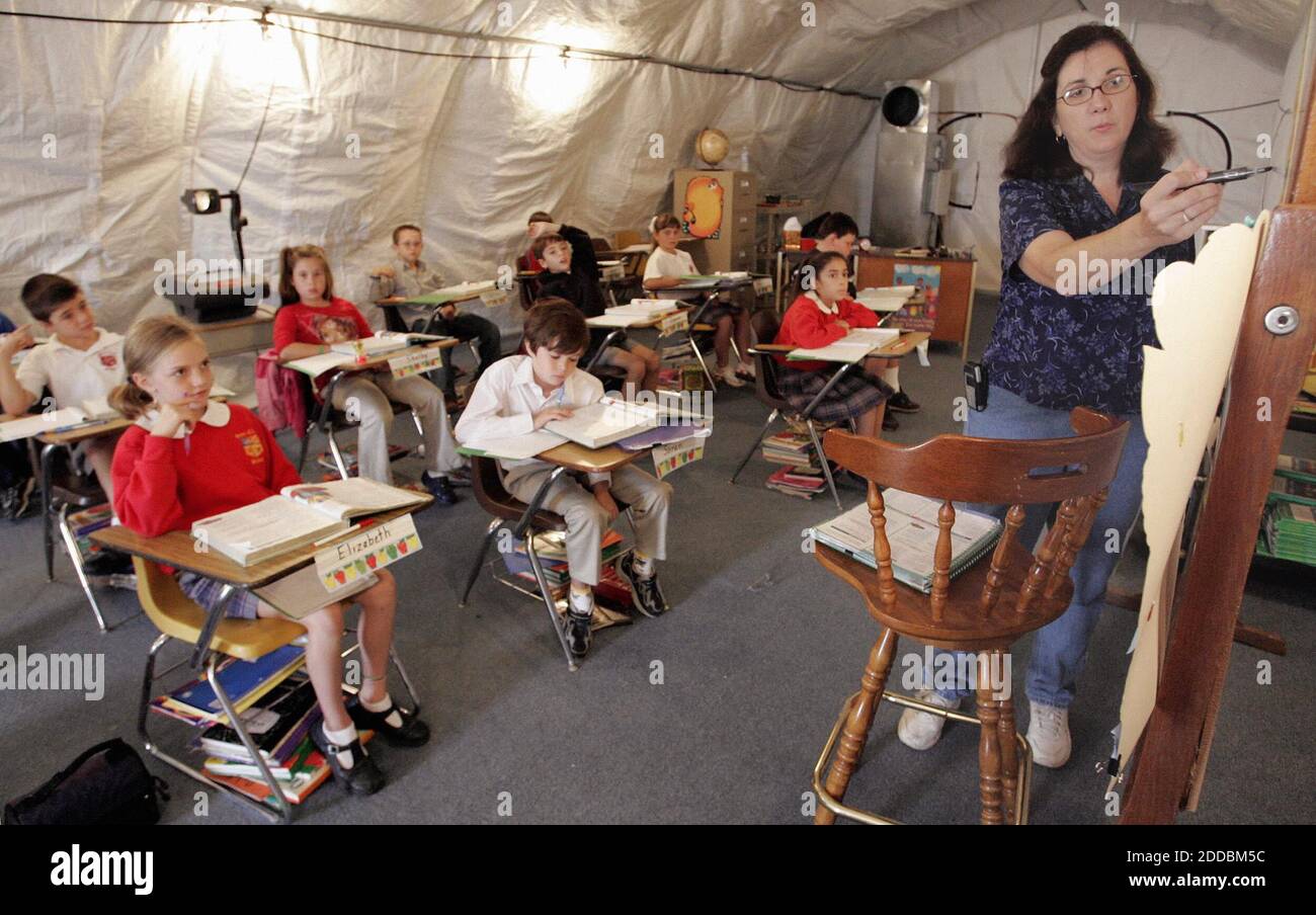 NO FILM, NO VIDEO, NO TV, NO DOCUMENTARY - Jennifer Courtault leads her  third-grade students in their temporary classrooms at St. Clare Elementary  School which is on the foundation of the original