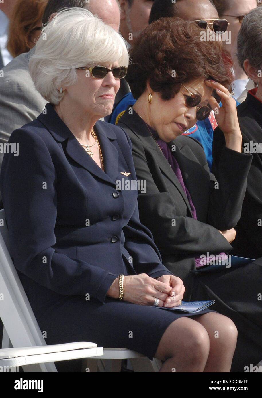 NO FILM, NO VIDEO, NO TV, NO DOCUMENTARY - Jane Smith Wolcott, left, widow of late pilot Michael Smith and Lona Onizuka, right, widow of late mission specialist Ellison Onizuka, are shown Saturday, January 28, 2006, during a public ceremony at the Kennedy Space Center, Florida, to honor the crew of Challenger STS 51L and all astronauts who have sacrificed their lives on the 20th anniversary of the Challenger accident. Photo by Red Huber/Orlando Sentinel/KRT/ABACAPRESS.COM Stock Photo