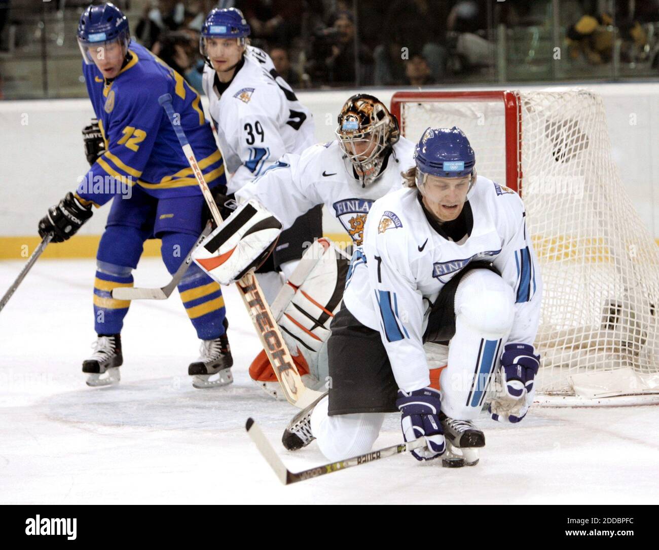 Goalie Stopping A Puck Stock Photo Alamy Goalie Stopping A Puck Stock Photo Alamy