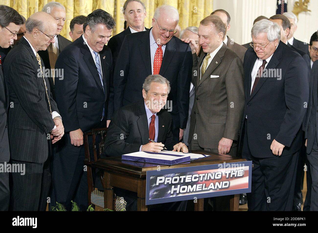 NO FILM, NO VIDEO, NO TV, NO DOCUMENTARY - President Bush signs a renewal of the USA Patriot Act, Thursday, March 9, 2006, a day before 16 major provisions of the old law expired, during a ceremony in the East Room of the White House. Photo by Chuck Kennedy/KRT/ABACAPRESS.COM Stock Photo