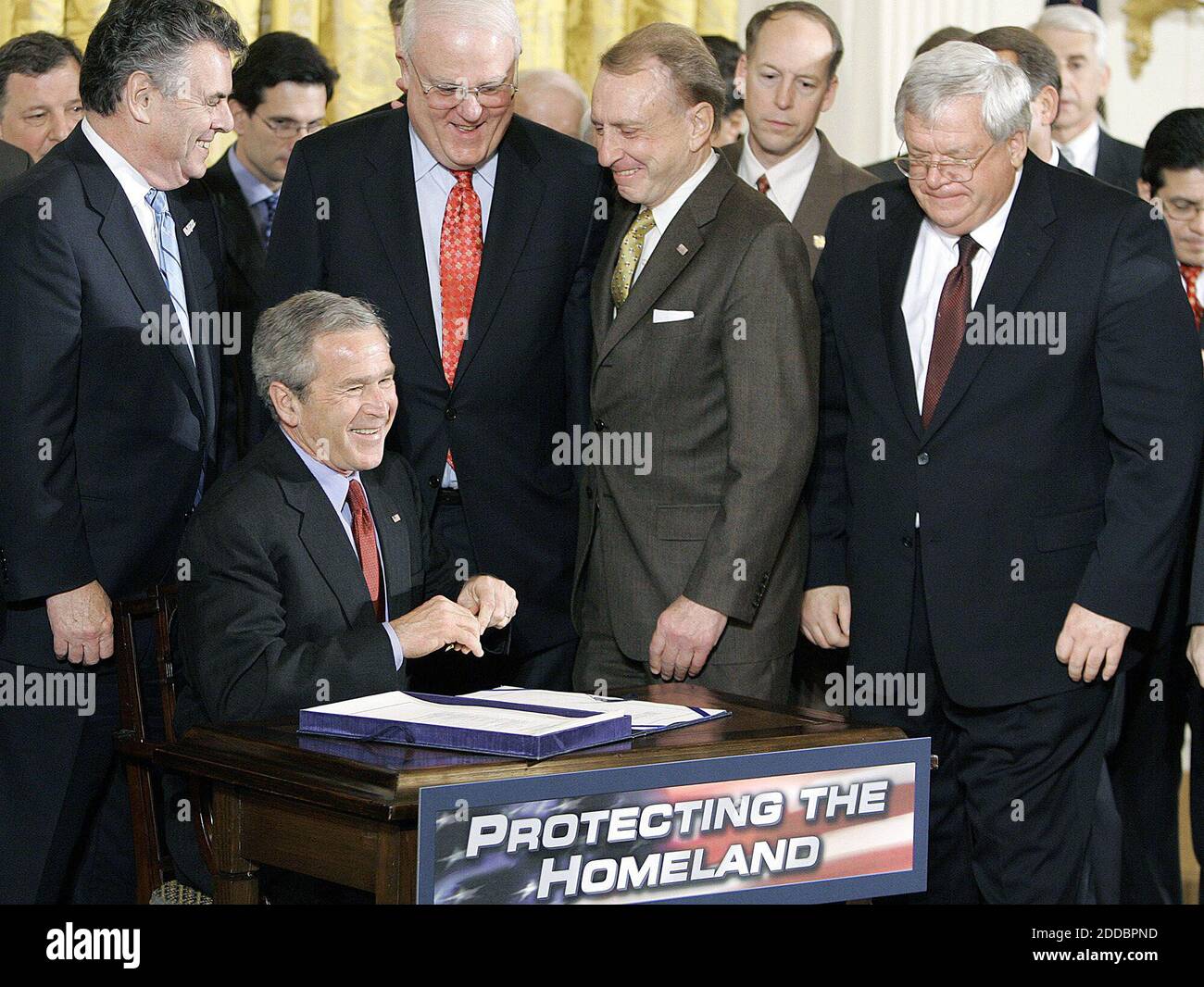 NO FILM, NO VIDEO, NO TV, NO DOCUMENTARY - President Bush signs a renewal of the USA Patriot Act, Thursday, March 9, 2006, a day before 16 major provisions of the old law expired, during a ceremony in the East Room of the White House. Photo by Chuck Kennedy/KRT/ABACAPRESS.COM Stock Photo