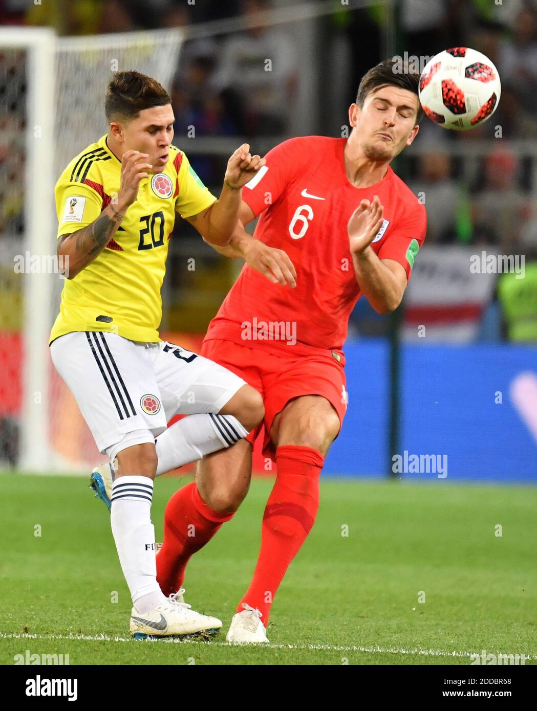 England's Harry Maguire and Colombia's Juan Fernando Quintero during the  FIFA World Cup 2018 1/8 final Colombia v England game at the Spartak  Stadium, Moscow, Russia, on July 3, 2018. Photo by