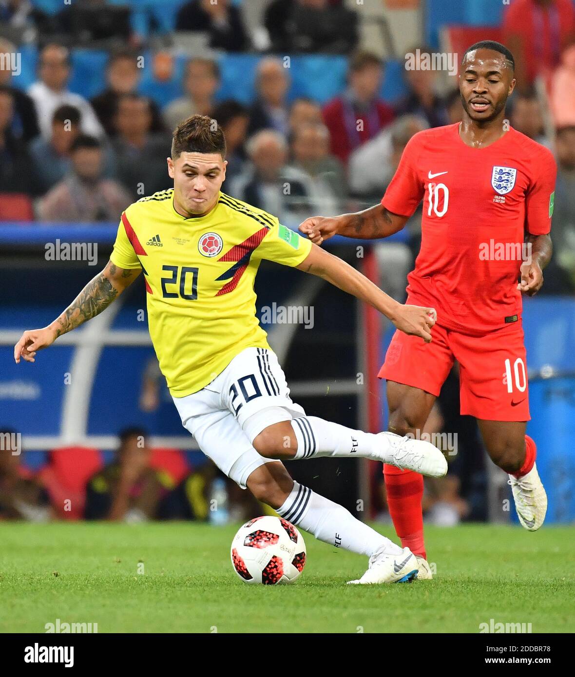 Colombia’s Juan Fernando Quintero and England’s Raheem Sterling during the FIFA World Cup 2018 1/8 final Colombia v England game at the Spartak Stadium, Moscow, Russia, on July 3, 2018. Photo by Christian Liewig/ABACAPRESS.COM Stock Photo