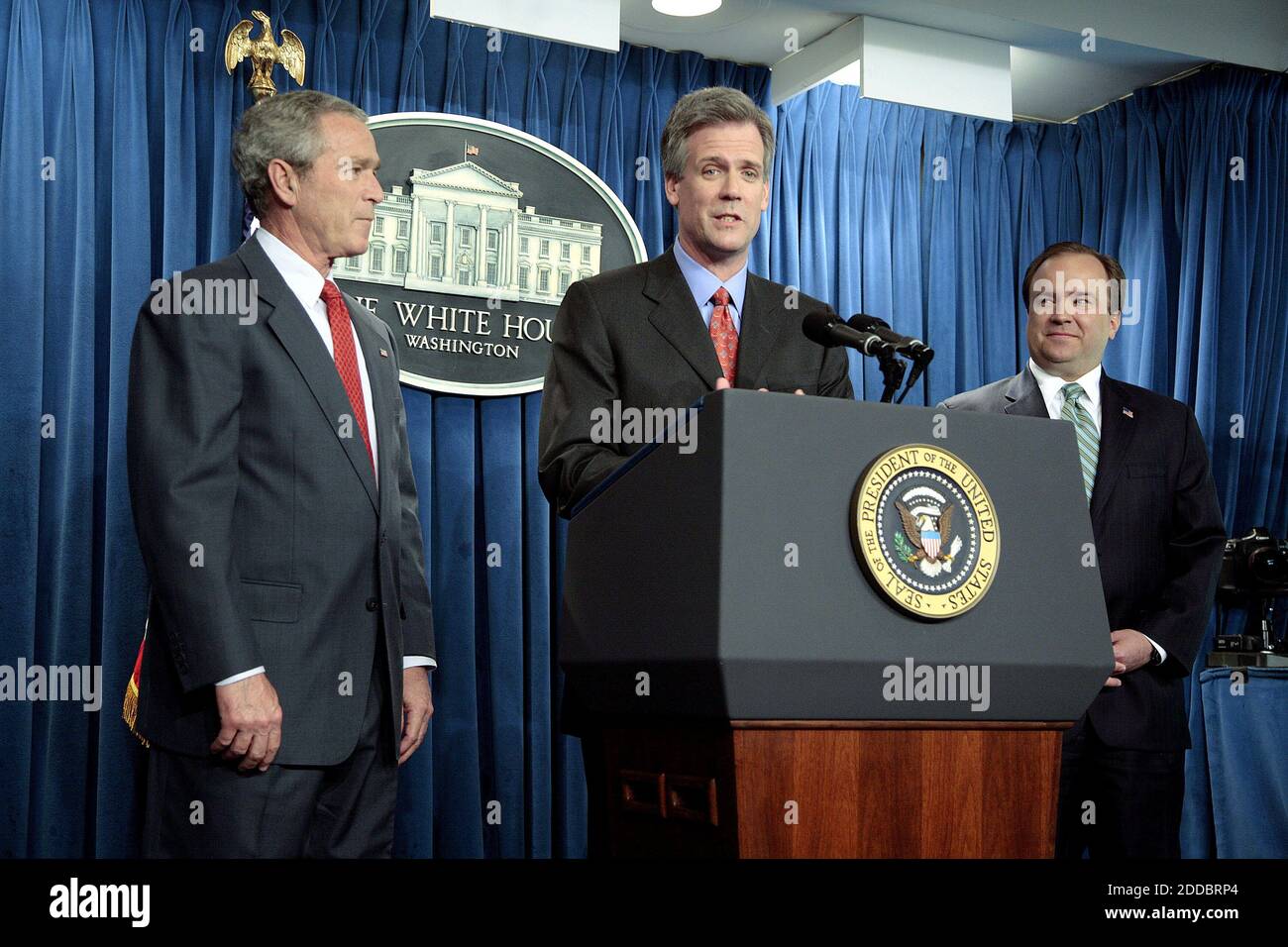 NO FILM, NO VIDEO, NO TV, NO DOCUMENTARY - President Bush presents Tony Snow as his new White House Press Secretary in Washington, DC, USA on April 26, 2006 . Snow, a Fox News radio host, will replace Scott McClellan, right, who announced his resignation last week as part of a staff shake-up engineered by new White House Chief of Staff Josh Bolten aimed at reviving Bush's presidency at the White House. Photo by Chuck Kennedy/KRT/ABACAPRESS.COM Stock Photo