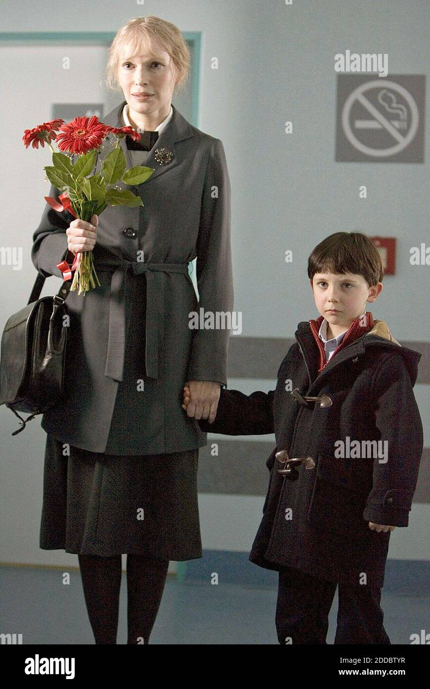NO FILM, NO VIDEO, NO TV, NO DOCUMENTARY - Mrs. Baylock (Mia Farrow) and Damien (Seamus Davey-Fitzpatrick) arrive at the hospital to visit Damien's mother, who has been seriously injured, in the movie, 'The Omen.' Photo via KRT/ABACAPRESS.COM Stock Photo