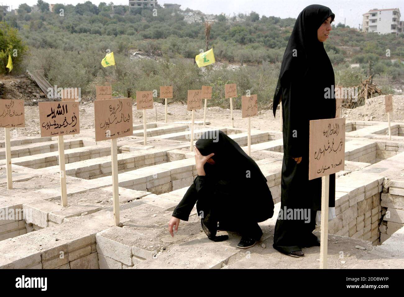 NO FILM, NO VIDEO, NO TV, NO DOCUMENTARY - In Qana, Lebanon, a town that has become synonymous with massacre in the minds of many Lebanese, families bury their dead, Friday, August 18, 2006. Photo by Paul Assaker/MCT/ABACAPRESS.COM Stock Photo