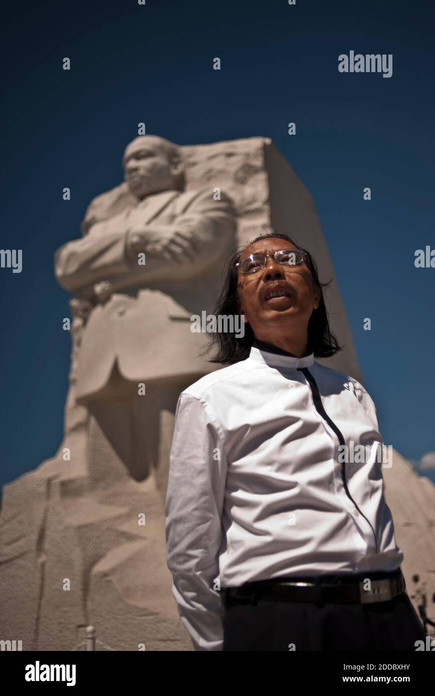 NO FILM, NO VIDEO, NO TV, NO DOCUMENTARY - Master Lei Yixin, the sculptor responsible for the Mountain of Despair and the Stone of Hope at the memorial, stands in front of his work, the Martin Luther King Jr. National Memorial, a 4-acre monument of stone, trees and water honoring the slain civil rights leader located along the Tidal Basin, August 22, 2011. King will be the first African-American honored with a monument on Washington's National Mall and the dedication will be Sunday, August 29, the 48th anniversary of his "I Have A Dream" speech. Photo by Andre Chung/MCT/ABACAPRESS.COM Stock Photo