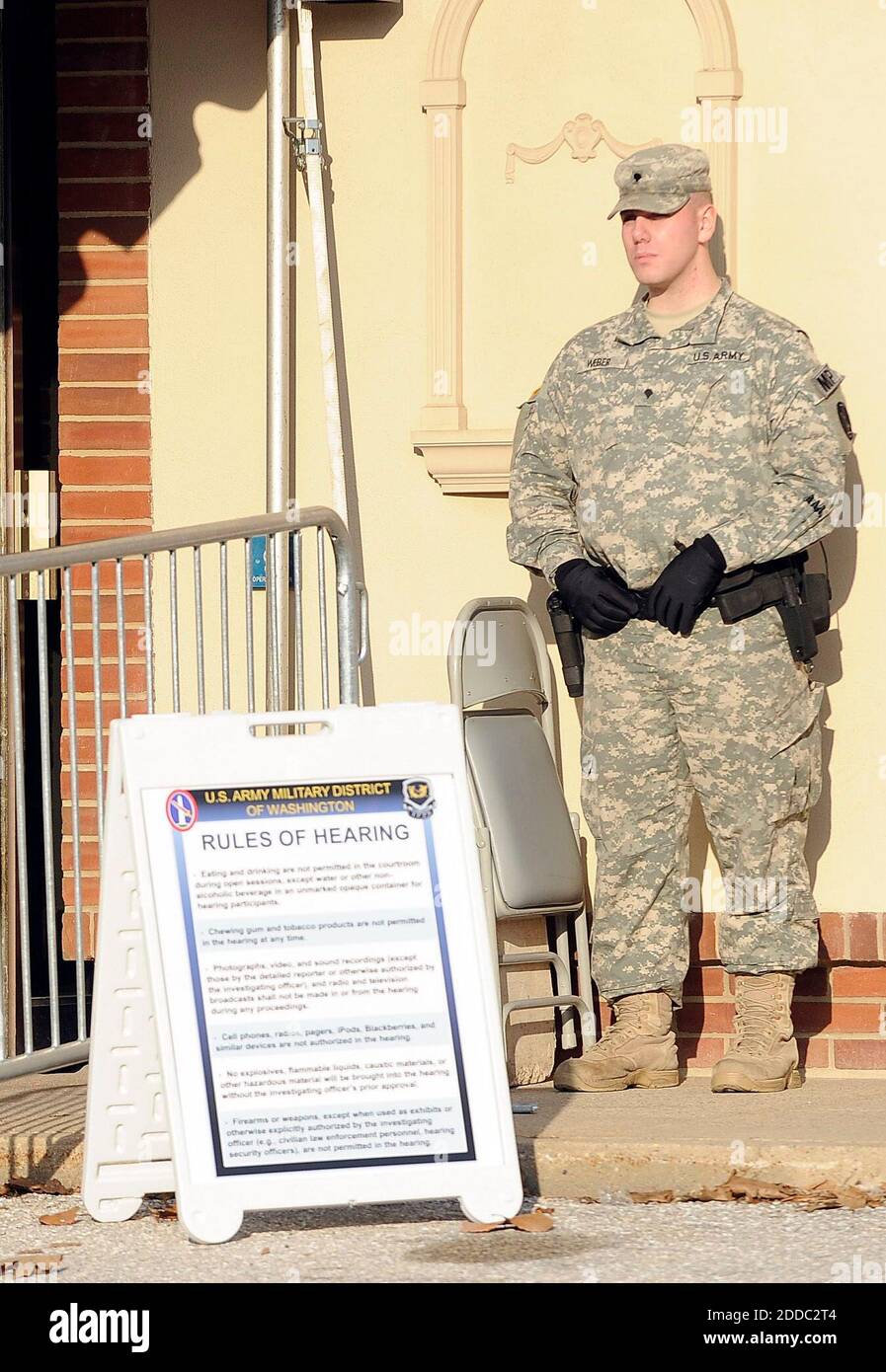 NO FILM, NO VIDEO, NO TV, NO DOCUMENTARY - Military police stand guard  outside the courthouse where Pfc. Bradley E. Manning will have his Article  32 hearing at Fort George C. Meade