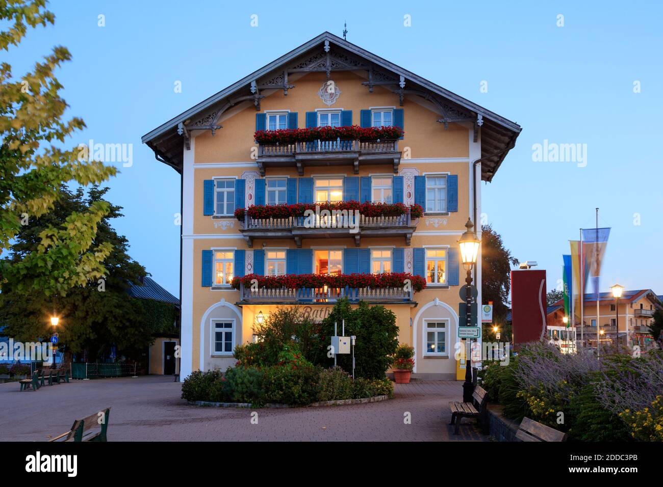Germany, Bavaria, Tegernsee, Old town hall at springtime dusk Stock Photo
