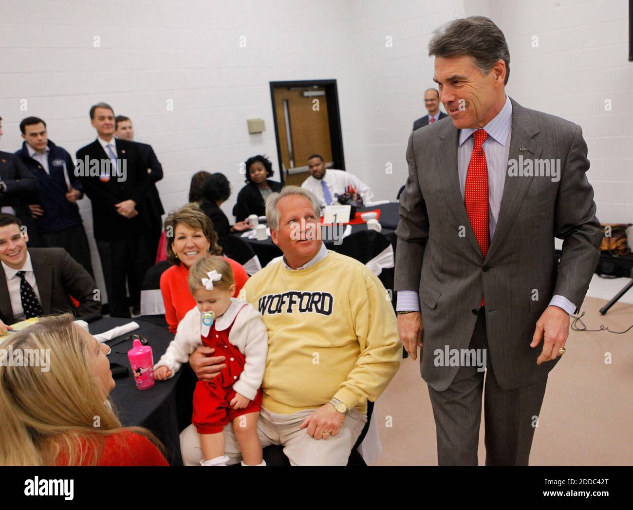 NO FILM, NO VIDEO, NO TV, NO DOCUMENTARY - Texas Gov. Rick Perry, a Republican presidential hopeful, arrives at the Martin Luther King Jr. celebration breakfast at the Canal Street Recreation Center in Myrtle Beach, South Carolina, USA, Monday, January 16, 2012. Photo by Steve Jessmore/The Sun News/MCT/ABACAPRESS.COM Stock Photo