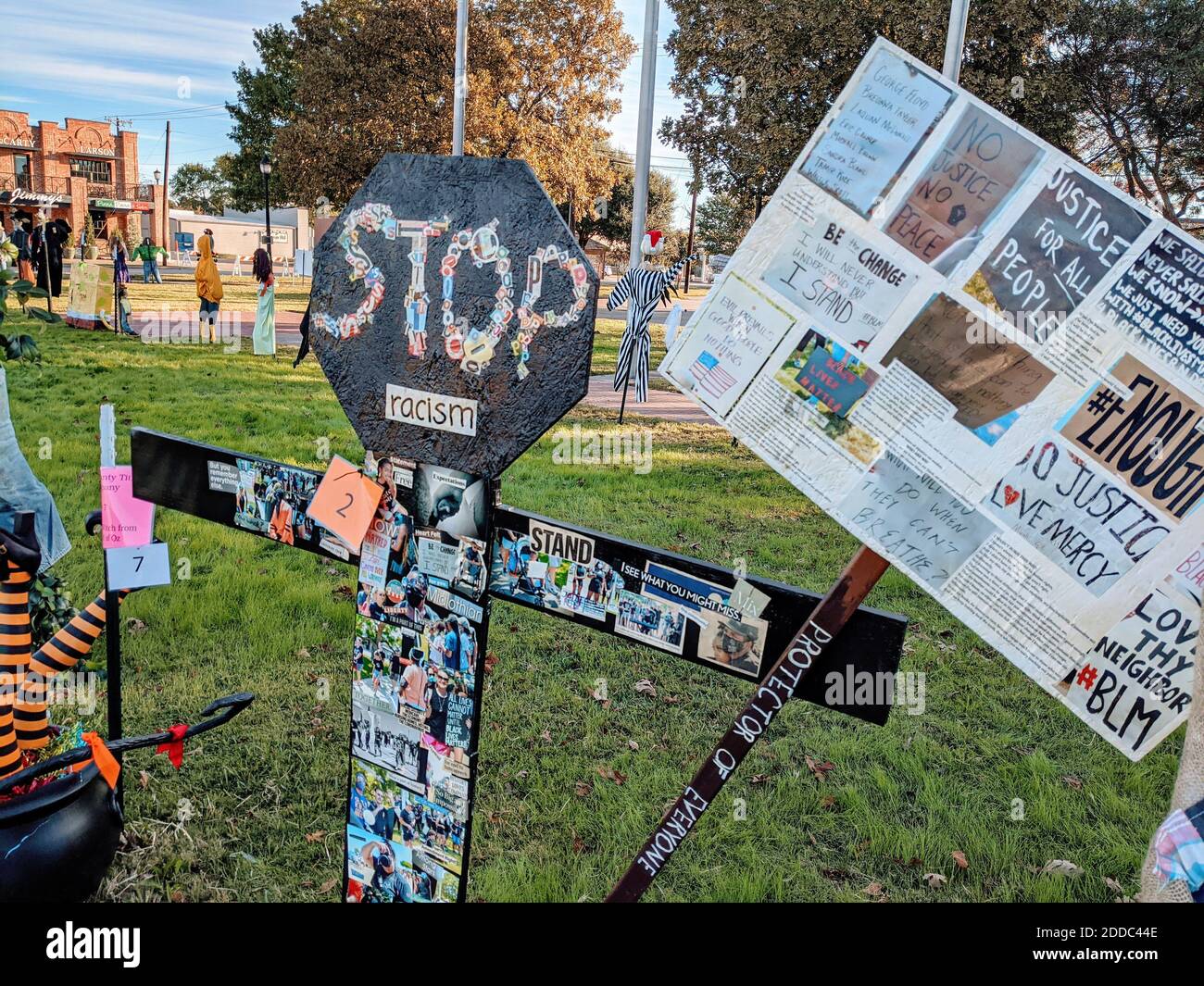 Fall scarecrow contest in Midlothian, Texas, had resident enter 'Stop Racism' scarecrow using clippings and photos of current events in USA. Stock Photo