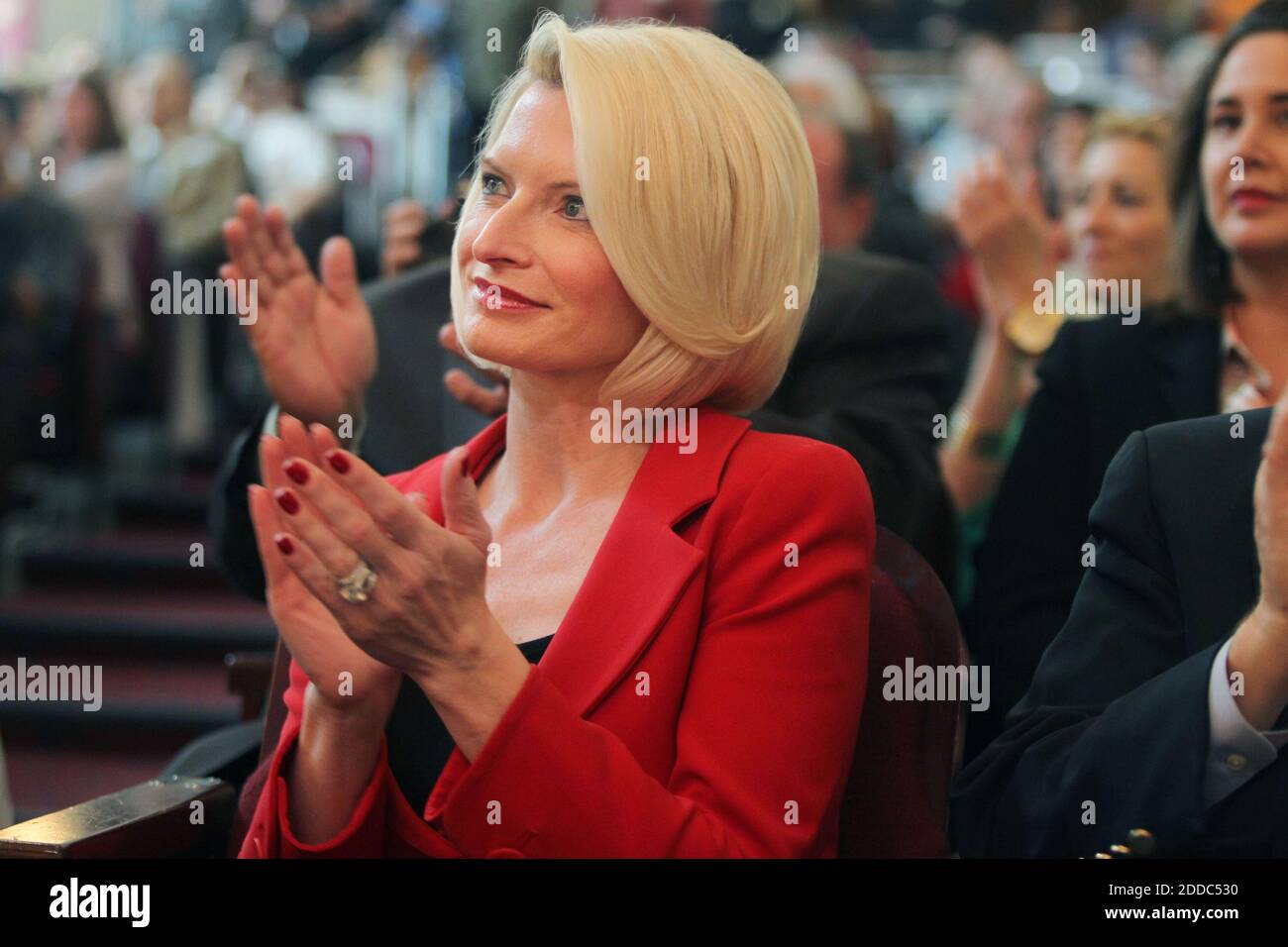 NO FILM, NO VIDEO, NO TV, NO DOCUMENTARY - Callista Gingrich applauds as her husband, Republican presidential candidate Newt Gingrich, delivers a speech at Florida International University's West Dade campus in Miami, Florida, USA, Wednesday, January 25, 2012. Photo by C.W. Griffin/Miami Herald/MCT/ABACAPRESS.COM Stock Photo