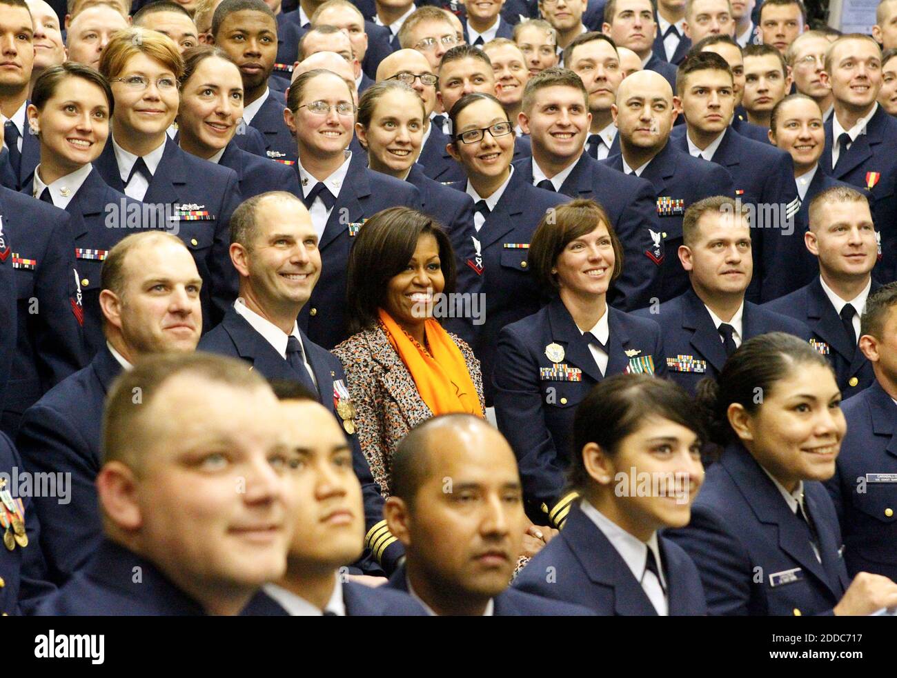 NO FILM, NO VIDEO, NO TV, NO DOCUMENTARY - First lady Michelle Obama, left center, poses for a photo with the crew of the Coast Guard Cutter Stratton during a tour of the ship on Coast Guard Island in Alameda, CA, USA ON March 31, 2012. The first lady made the trip to California to join in the commissioning ceremony placing the ship into active service. Mrs. Obama, a sponsor of the Cutter Stratton, helped christen the ship in Pascagoula, Mississippi, in 2010 by breaking a champagne bottle over the bow. Photo by Anda Chu/Oakland Tribune/MCT/ABACAPRESS.COM Stock Photo