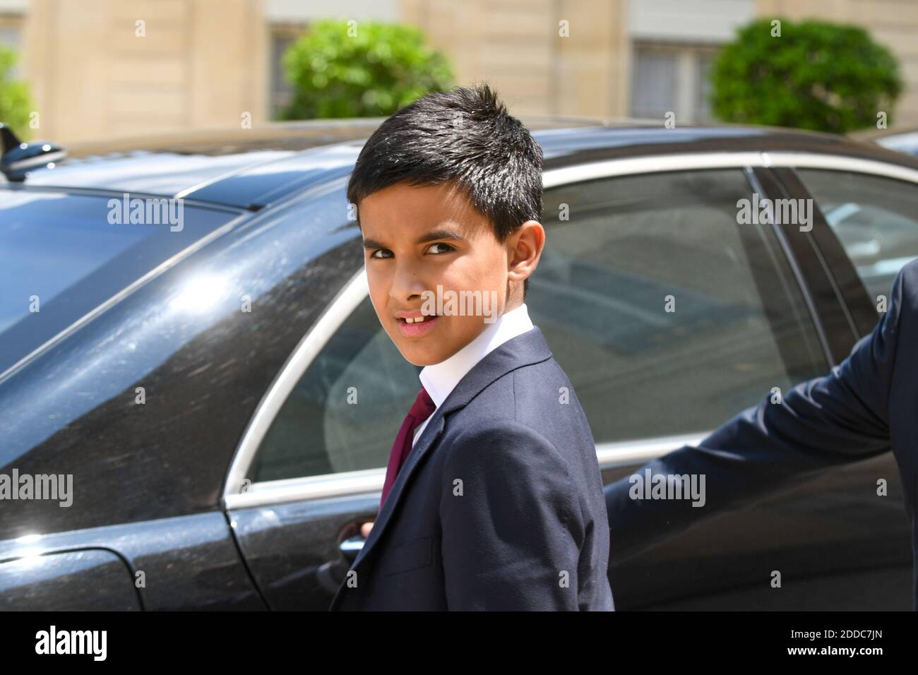 Emir of Qatar's 10-year-old son Sheikh Hamad Bin Tamim Al Thani leaves the  Elysee Palace, after lunch with his father and French president Emmanuel  Macron, in Paris, France on July 6, 2018.