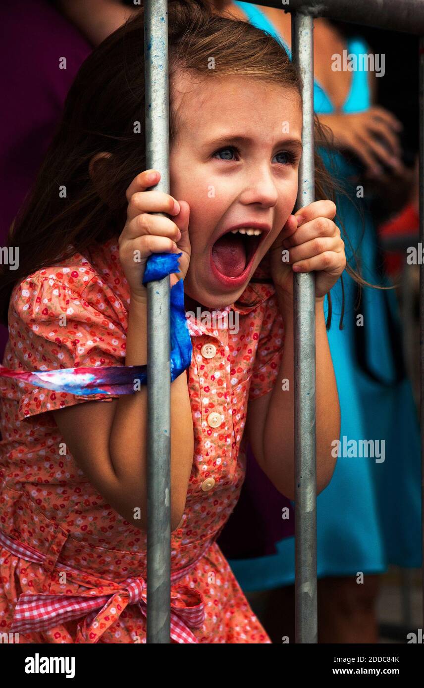 NO FILM, NO VIDEO, NO TV, NO DOCUMENTARY - "Daddy," screams a little girls as her smiling father approaches, still wearing his desert utilities during his homecoming from deployment with Marine Heavy Helicopter Squadron 362 on February 28, 2011 at Marine Corps Air Station, Kaneohe Bay, Hawaii. This photo received an honorable mention, feature in the Military Photographer of the Year competition. Photo byCpl. Tyler L. Main/US Marines/MCT/ABACAPRESS.COM Stock Photo