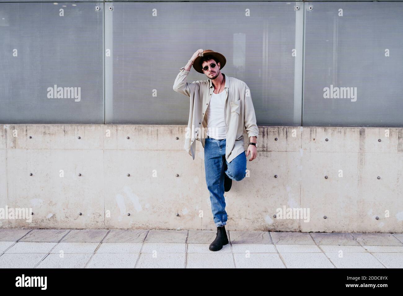 Portrait man standing hat hi-res stock photography and images - Alamy