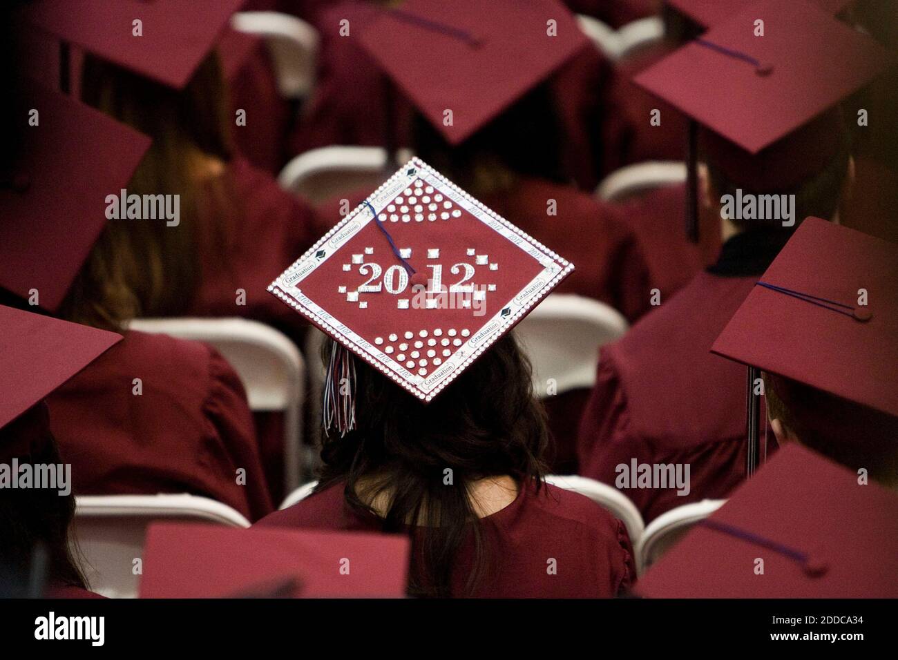 NO FILM, NO VIDEO, NO TV, NO DOCUMENTARY - A student decorated her mortar board during the Joplin High School Commencement Exercises for the Class of 2012 at the Missouri Southern State University Leggett & Platt Athletic Center on Monday, May 21, 2012, in Joplin, Missouri. President Barack Obama spoke at the event in commemoration of the one year anniversary of the city being struck by an EF-5 tornado. Photo by Shane Keyser/Kansas City Star/MCT/ABACAPRESS.COM Stock Photo