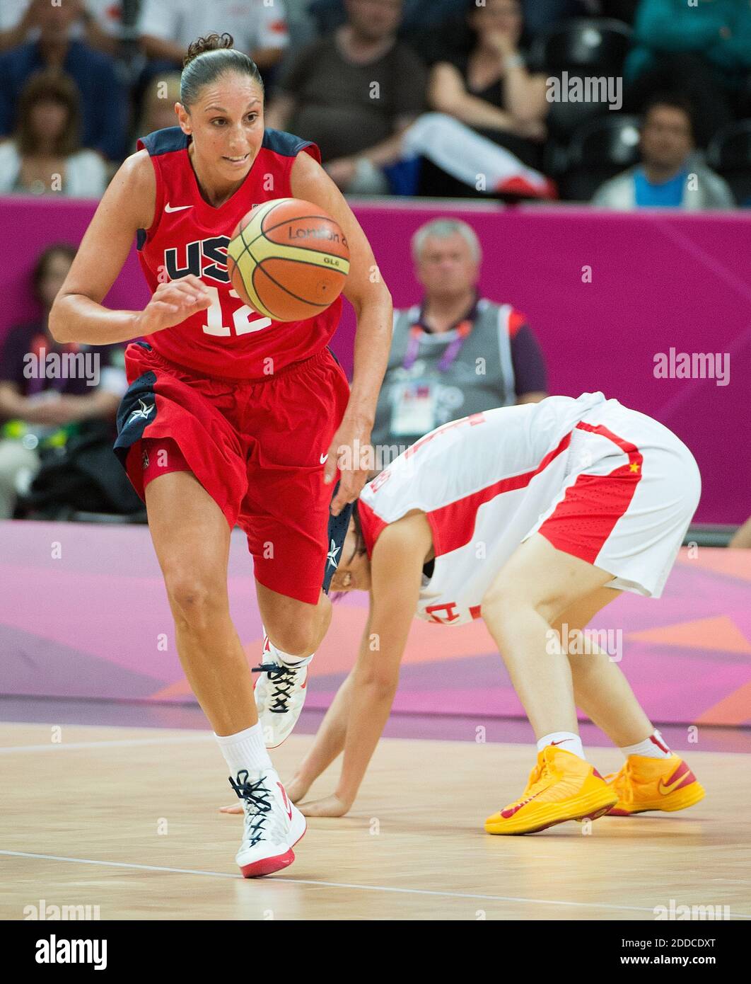 NO FILM, NO VIDEO, NO TV, NO DOCUMENTARY - USA's Diana Taurasi (12) brings  the ball up the court after a steal against China during their game at the  Basketball Arena at