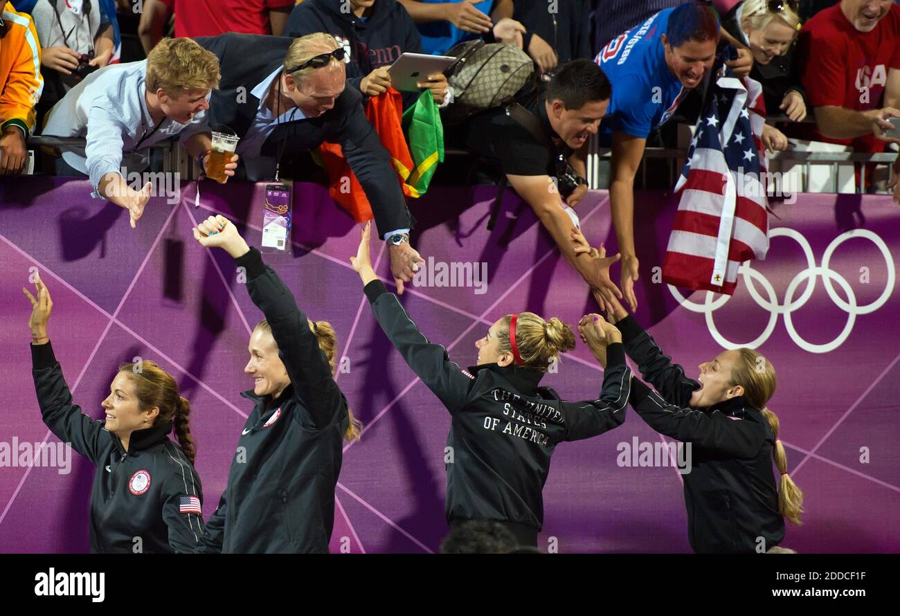 NO FILM, NO VIDEO, NO TV, NO DOCUMENTARY - Gold medal winners Misty May-Treanor and Kerri Walsh Jennings (left and second from left) of the United States and silver medalists Jennifer Kessy and April Ross of the United States (second from right and right) received congratulations from the crowd prior to their medal ceremony at Horse Guard Parade during the 2012 Summer Olympic Games in London, UK, Wednesday, August 8, 2012. Photo by David Eulitt/Kansas City Star/MCT/ABACAPRESS.COM Stock Photo