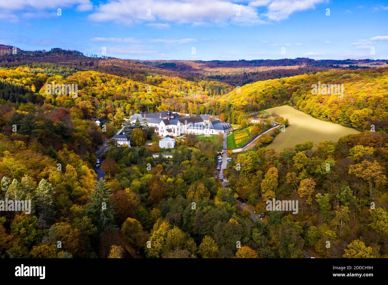 Eberbach Abbey surrounded with forests in Autumn Stock Photo