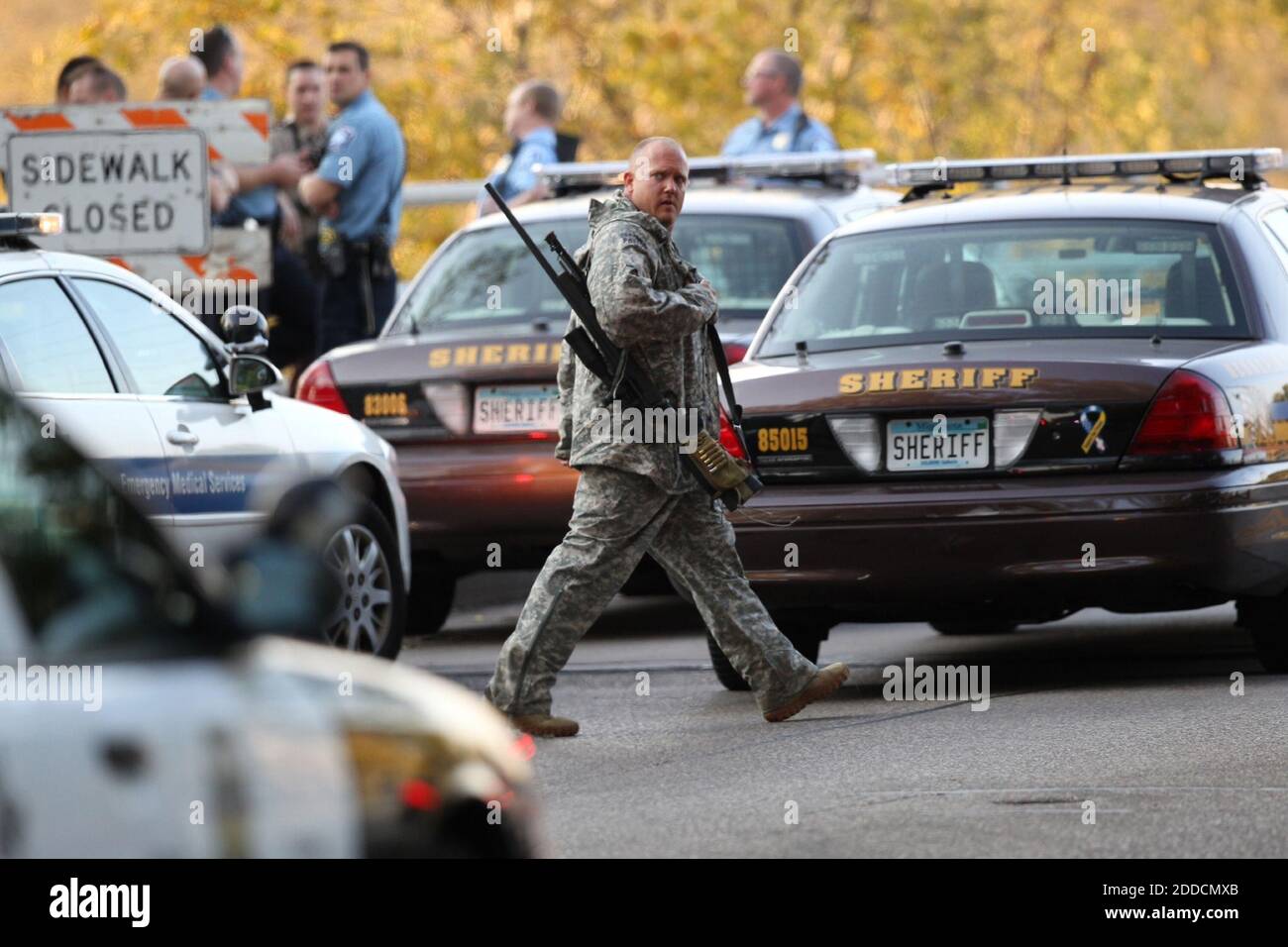 NO FILM, NO VIDEO, NO TV, NO DOCUMENTARY Police secure the area