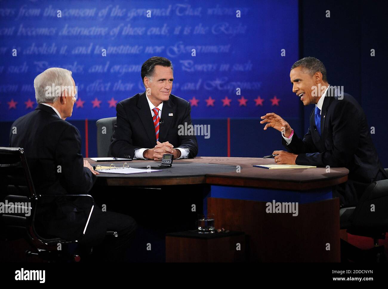 NO FILM, NO VIDEO, NO TV, NO DOCUMENTARY - Republican presidential candidate Mitt Romney listens as President Barack Obama makes a point during the final presidential debate at Lynn University in Boca Raton, Florida, USA, on Monday, October 22, 2012. Bob Schieffer was the moderator. Photo by Robert Duyos/Sun Sentinel/MCT/ABACAPRESS.COM Stock Photo