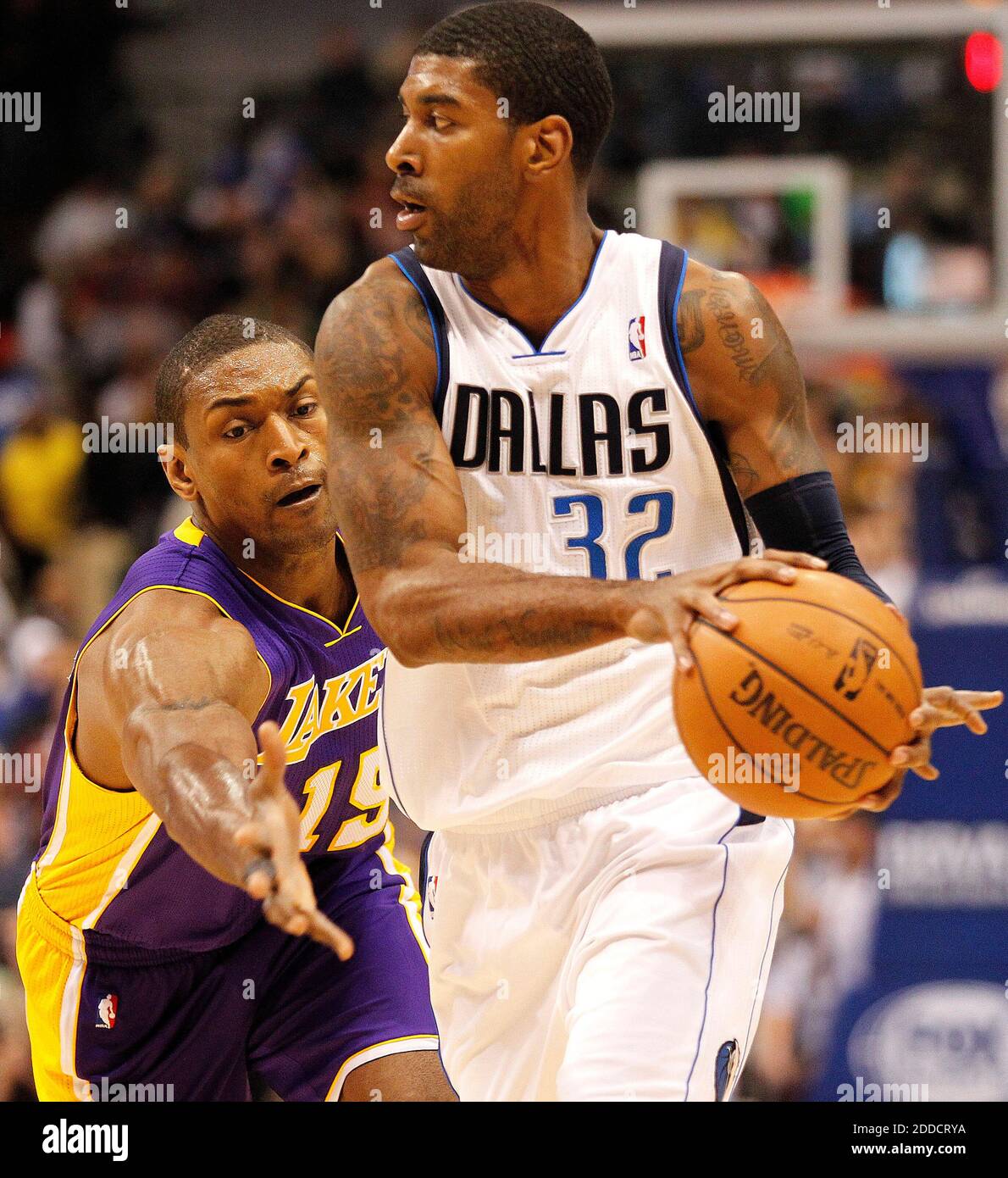 NO FILM, NO VIDEO, NO TV, NO DOCUMENTARY - Los Angeles Lakers small forward Metta World Peace (15) pressures Dallas Mavericks shooting guard O.J. Mayo (32) in the first half at the American Airlines Center in Dallas, TX, USA on November 24, 2012. Photo by Ron Jenkins/Fort Worth Star-Telegram/MCT/ABACAPRESS.COM Stock Photo