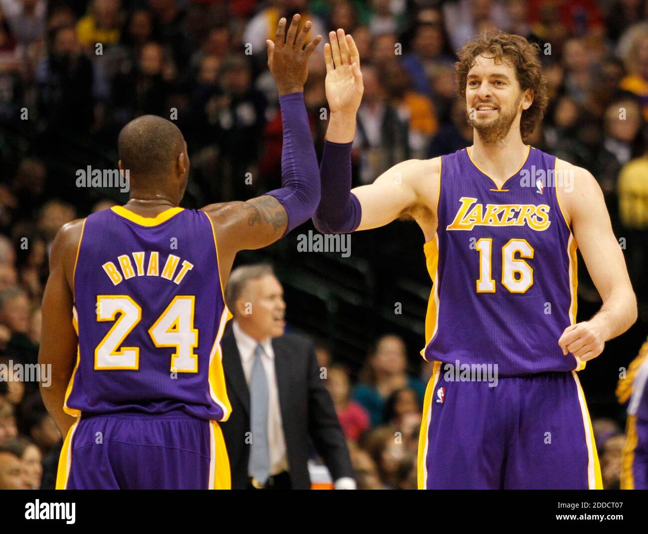 NO FILM, NO VIDEO, NO TV, NO DOCUMENTARY - Los Angeles Lakers shooting guard Kobe Bryant (24) and power forward Pau Gasol (16) celebrate in the first half of an NBA game against the Dallas Mavericks at the American Airlines Center in Dallas, TX, USA on November 24, 2012. Photo by Ron Jenkins/Fort Worth Star-Telegram/MCT/ABACAPRESS.COM Stock Photo
